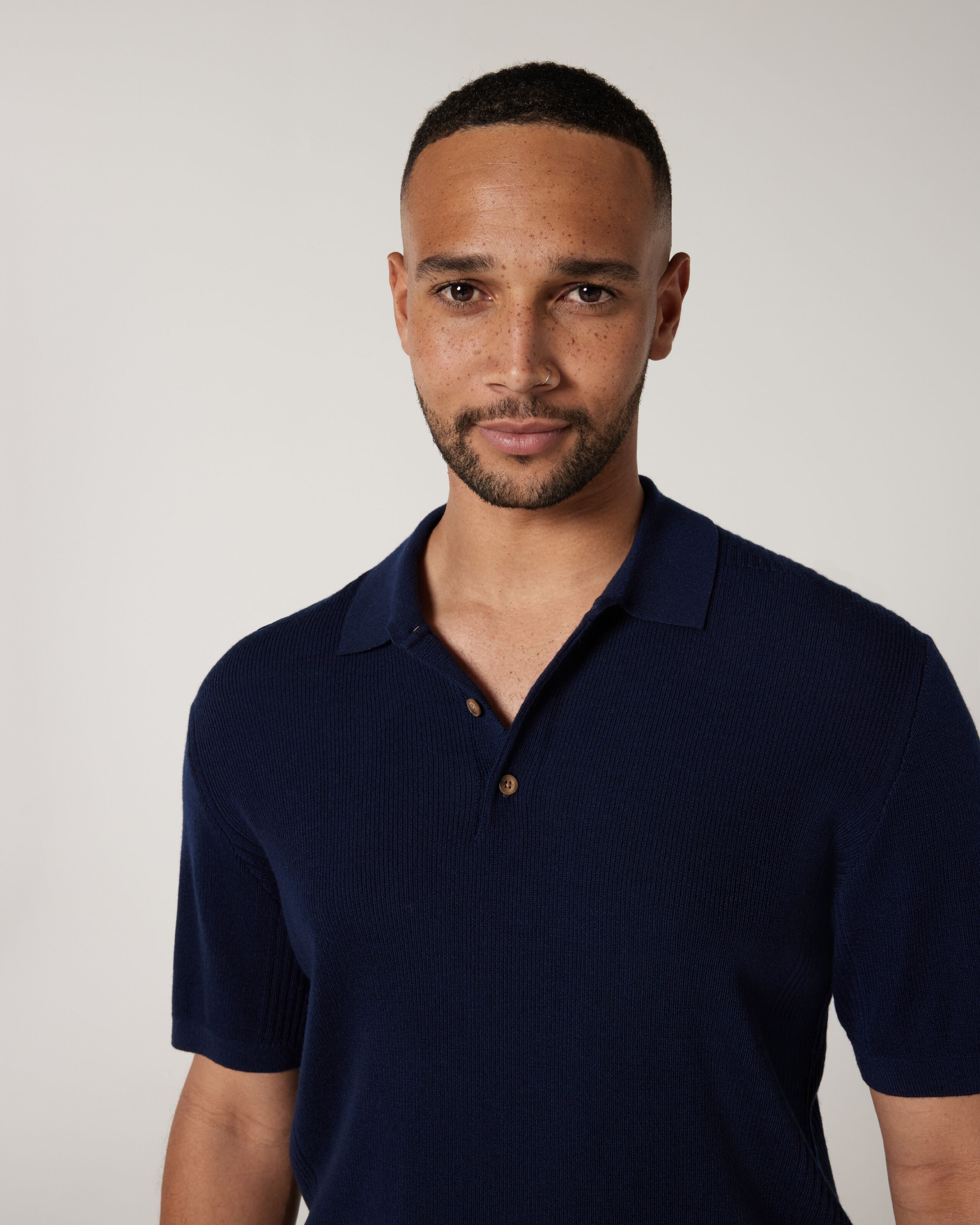 Navy knitted store polo shirt